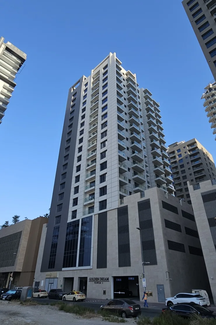 Full tower from street with Golden Dream Tower 1 signage