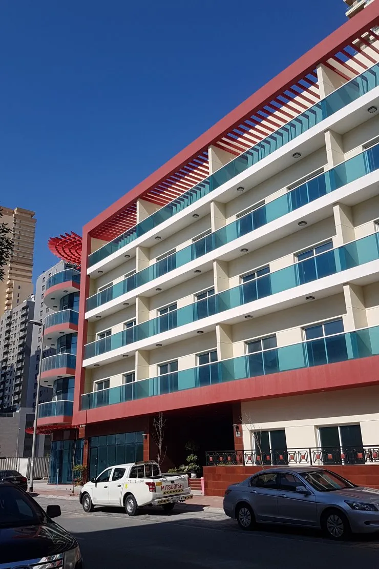 Side view of red frame, pergola and balconies