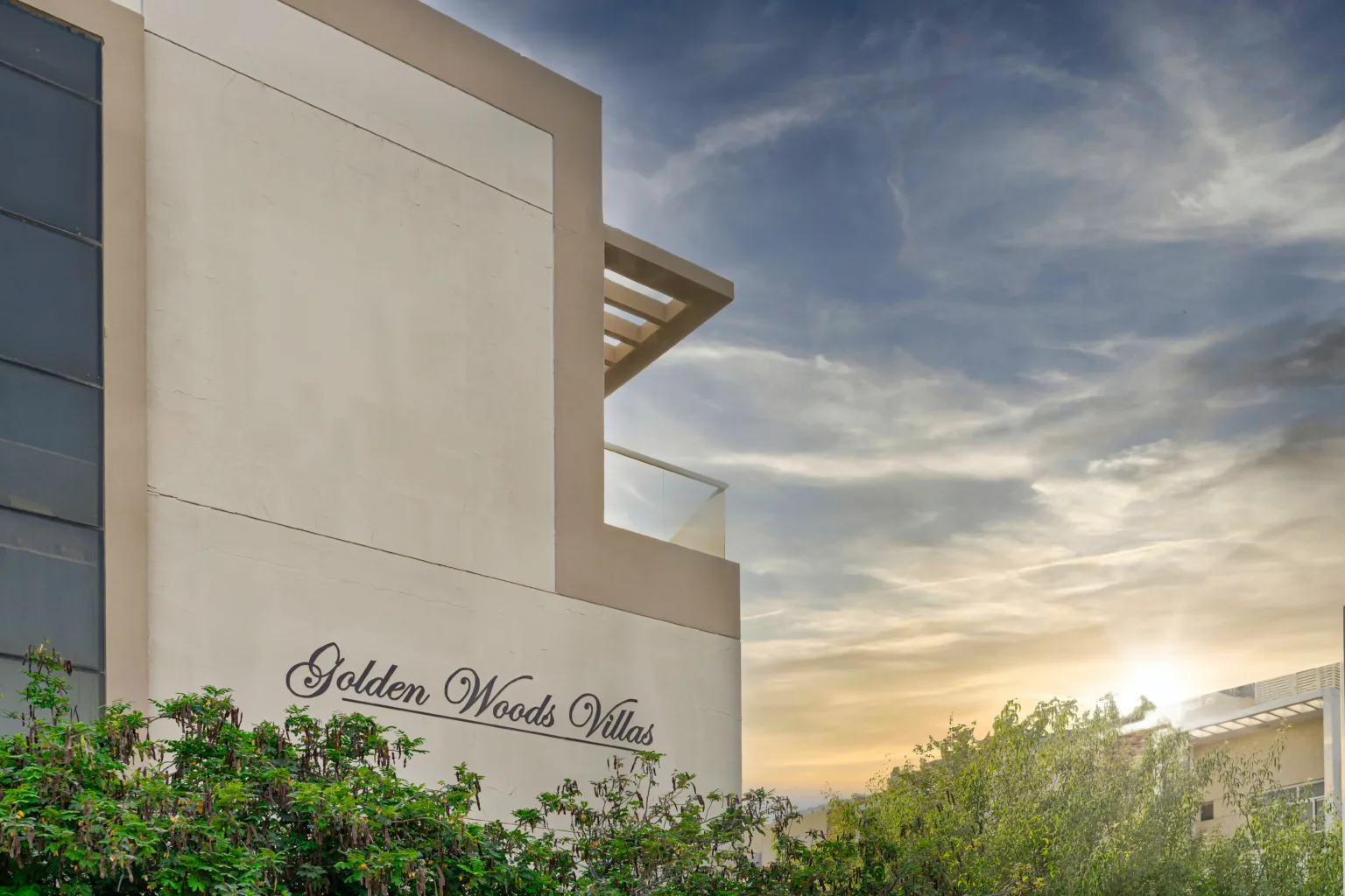 Villa corner with Golden Woods Villas signage