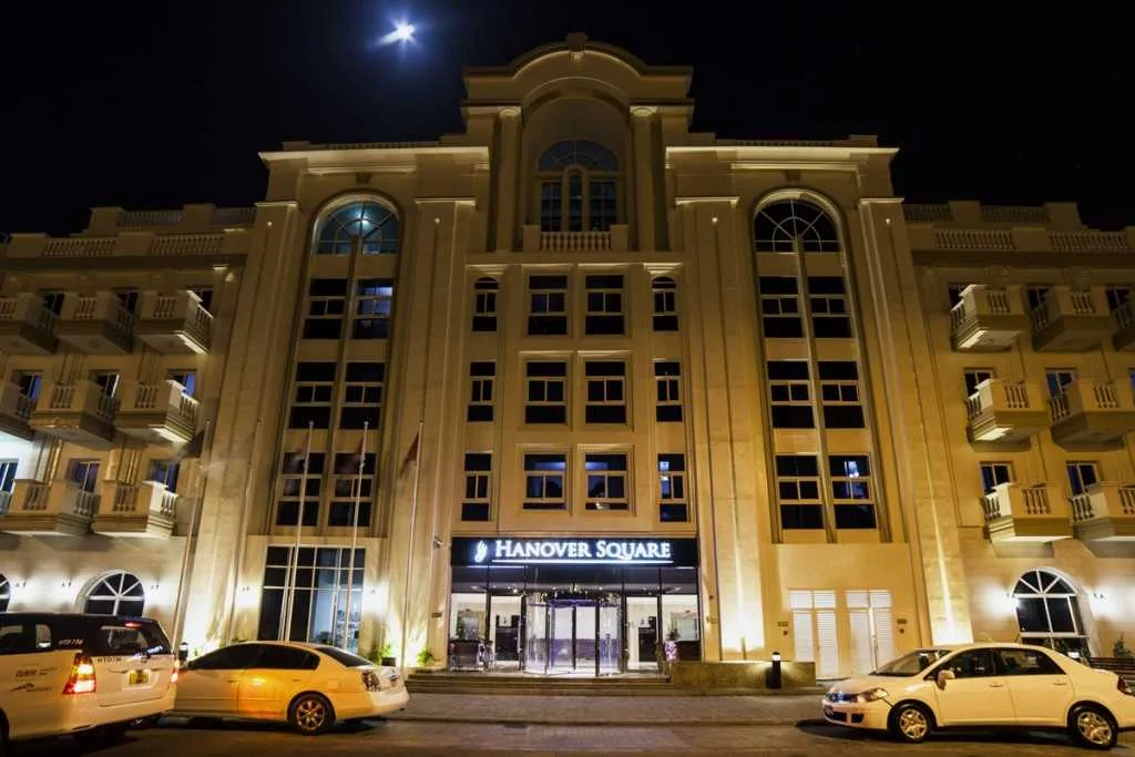 Night view of Hanover Square facade and entrance