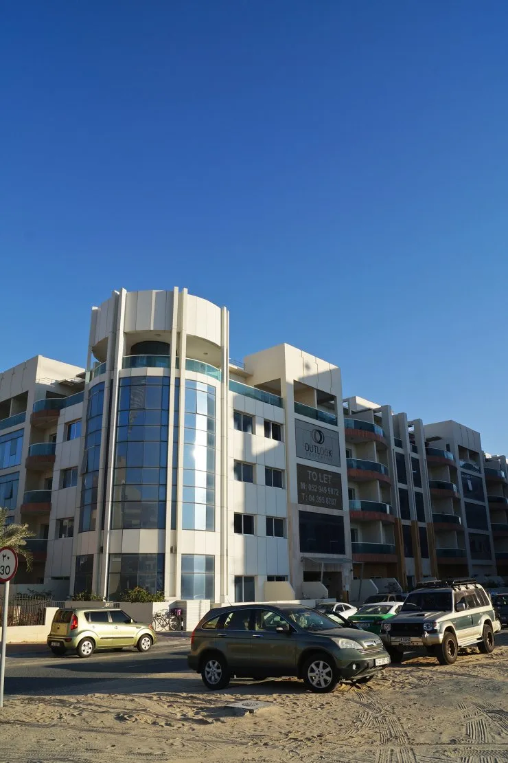 Street-level view of tower and balconies