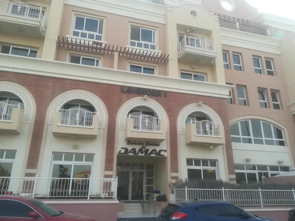 Entrance with Lavender 1 sign and arched balconies