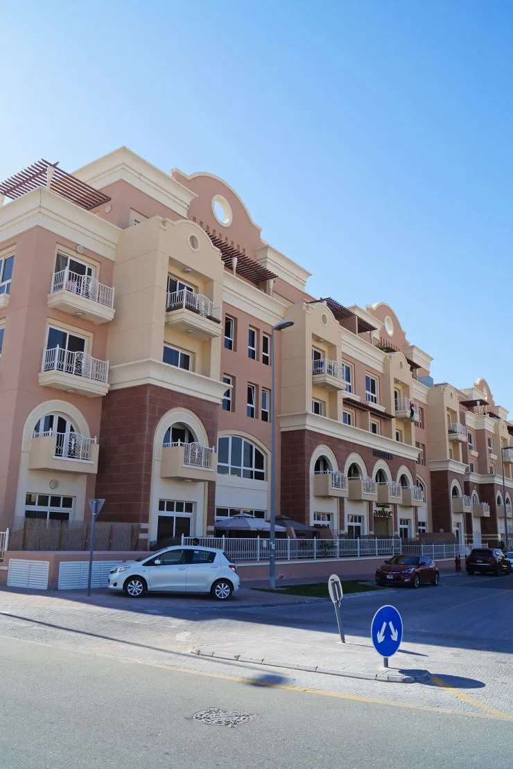 Pink and cream low-rise facade from the street