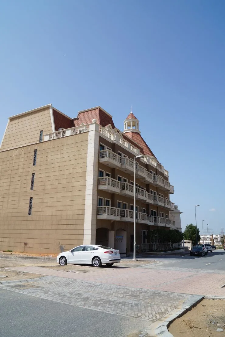 Side elevation with balconies and turret, same chateau style