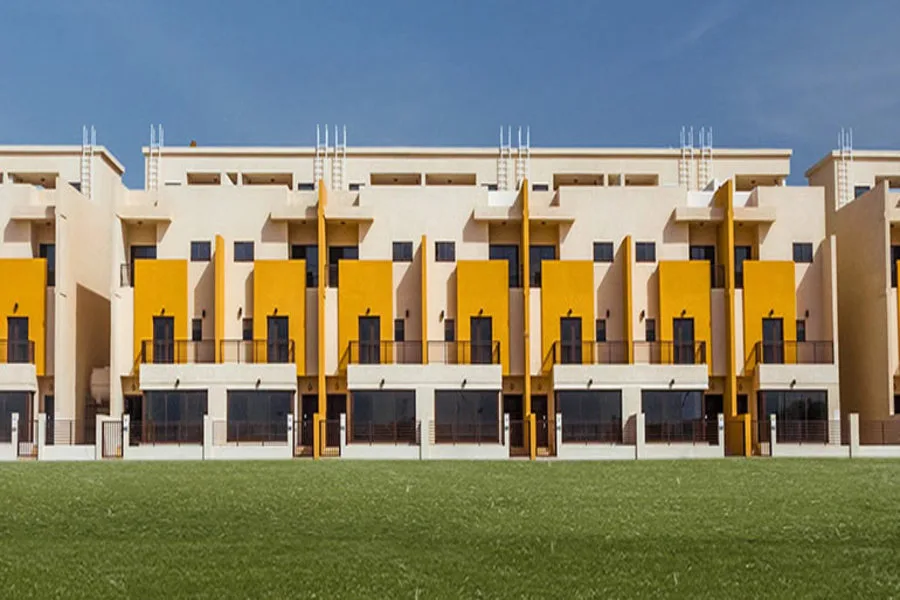 Townhouse block front with yellow accent fins