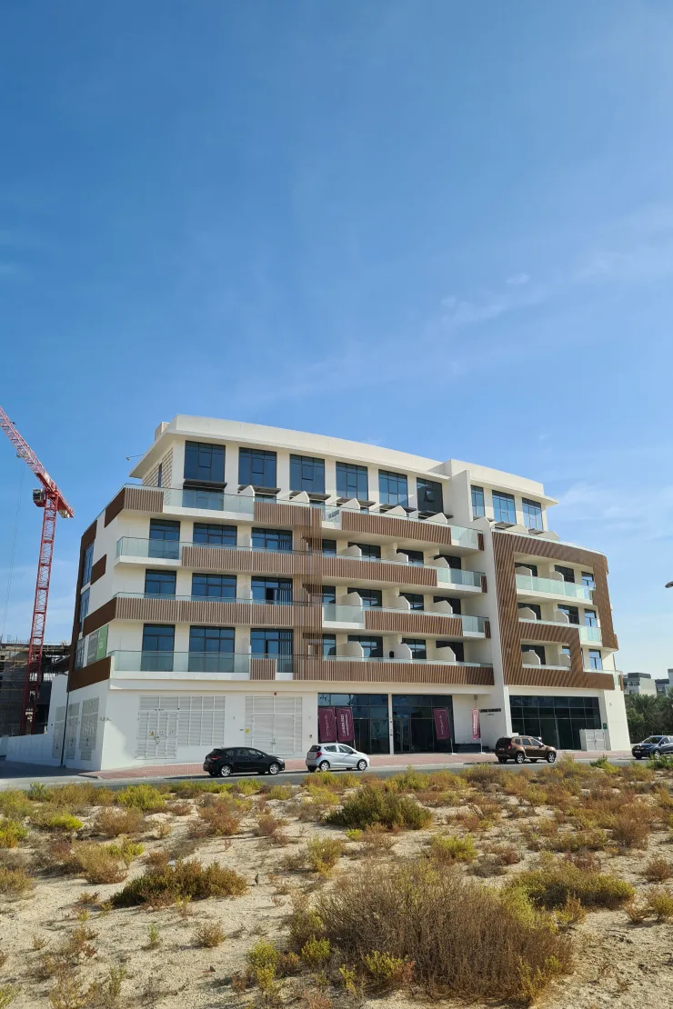 Whole building, ground to roof, blue sky