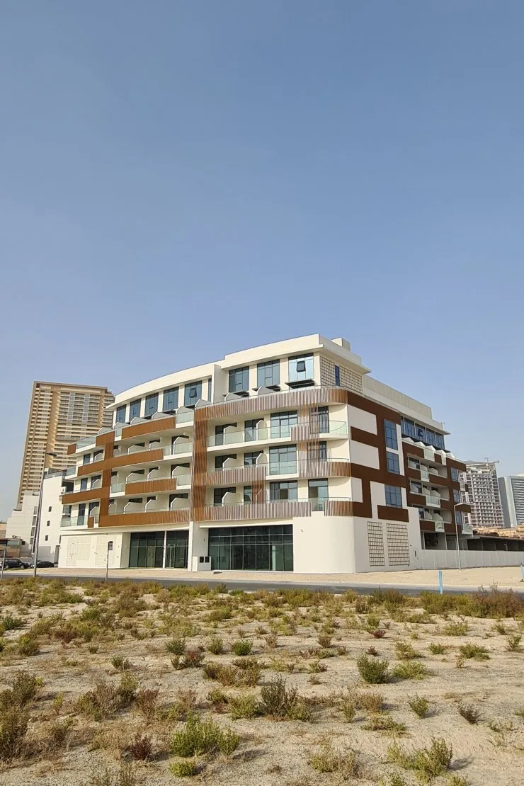 Corner view of full building with timber cladding