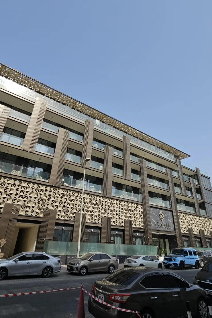 Street view of facade with Lusail sign