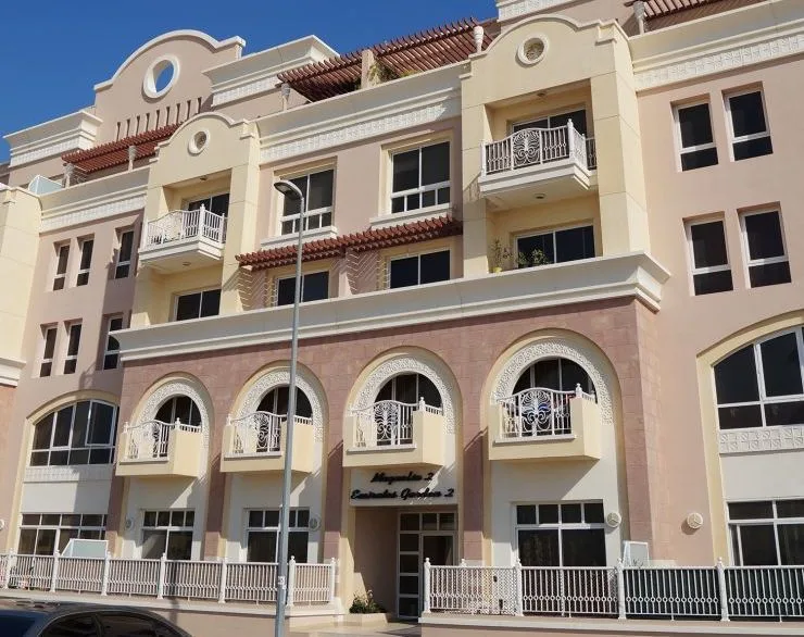 Arched entrance and balconies, Magnolia 2 Emirates Garden 2
