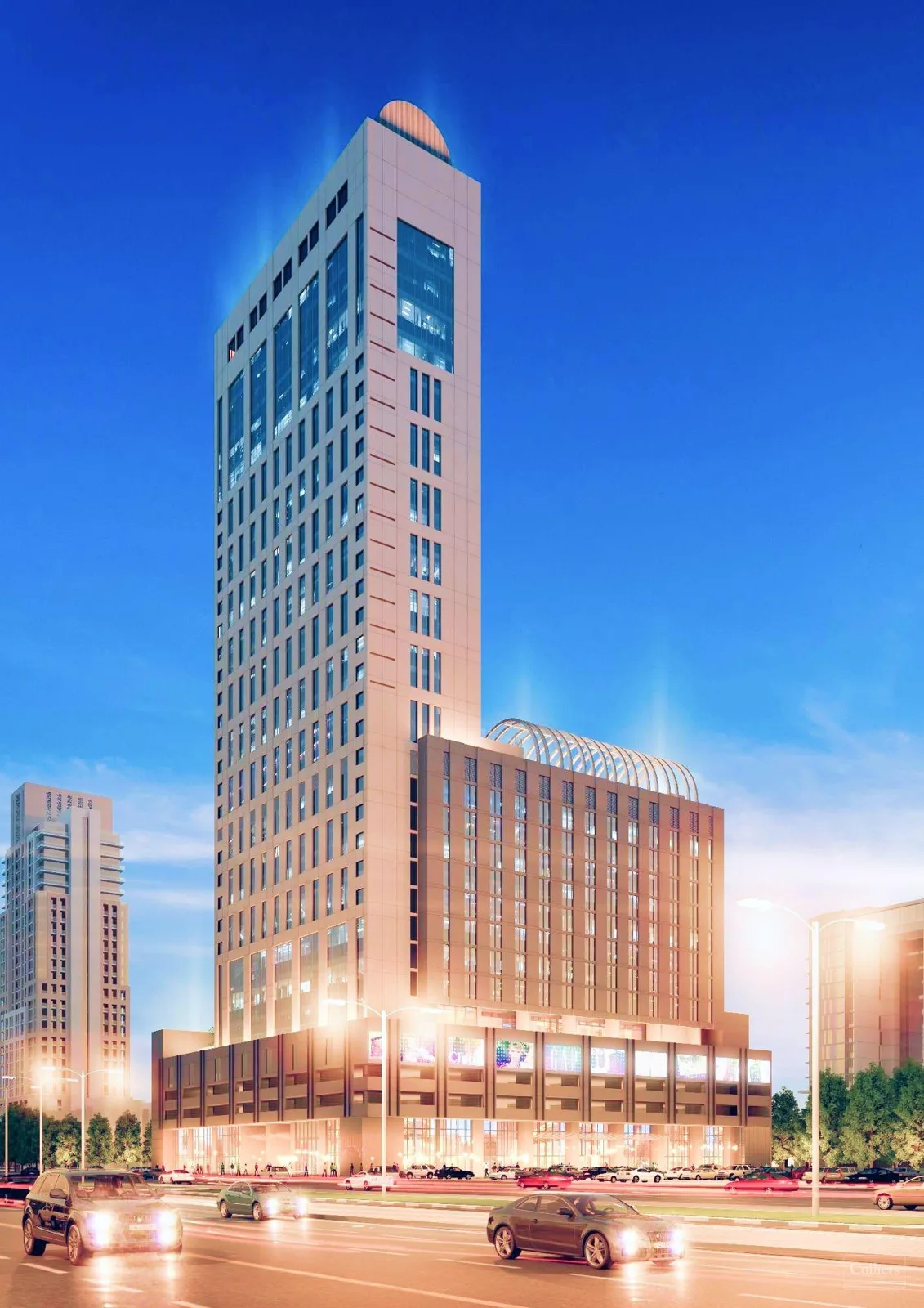 Full tower with podium and glass-ribbed crown at dusk