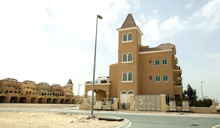 Corner tower with tiled pyramid roof, Mediterranean style
