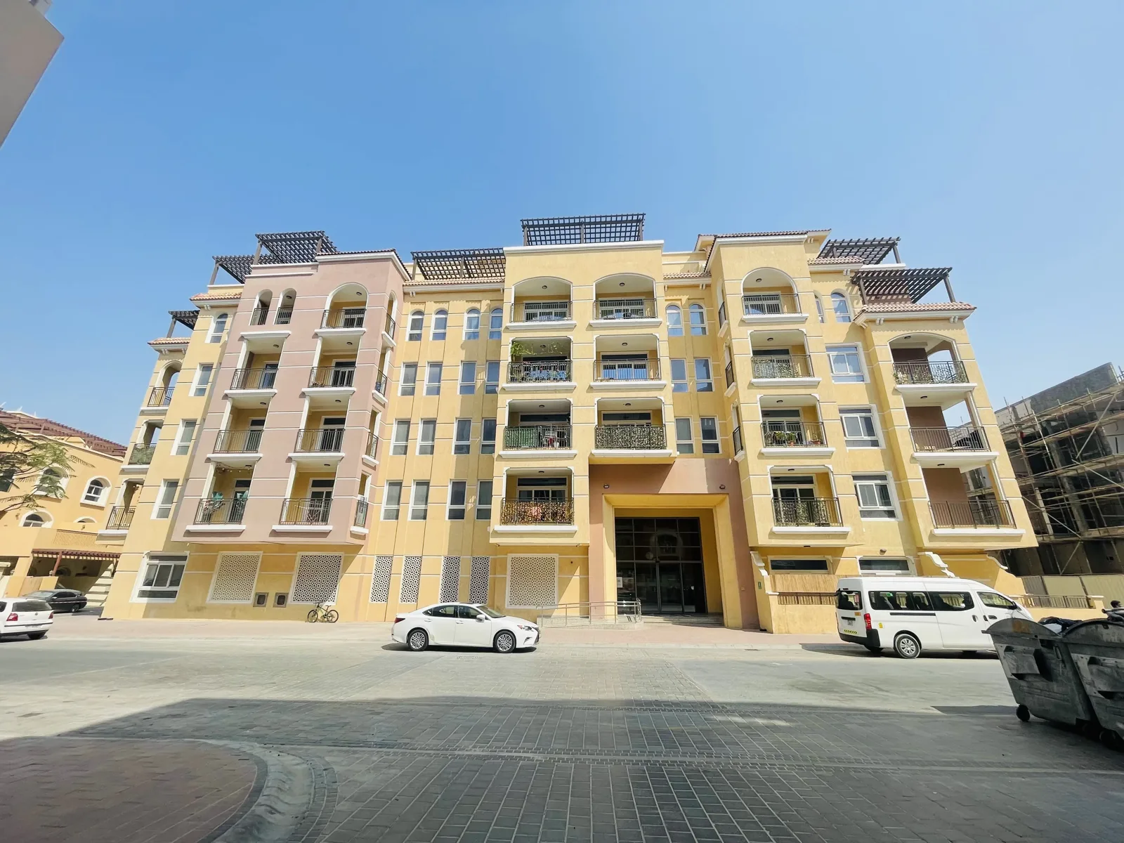 Front facade with main entrance, pergola rooftop