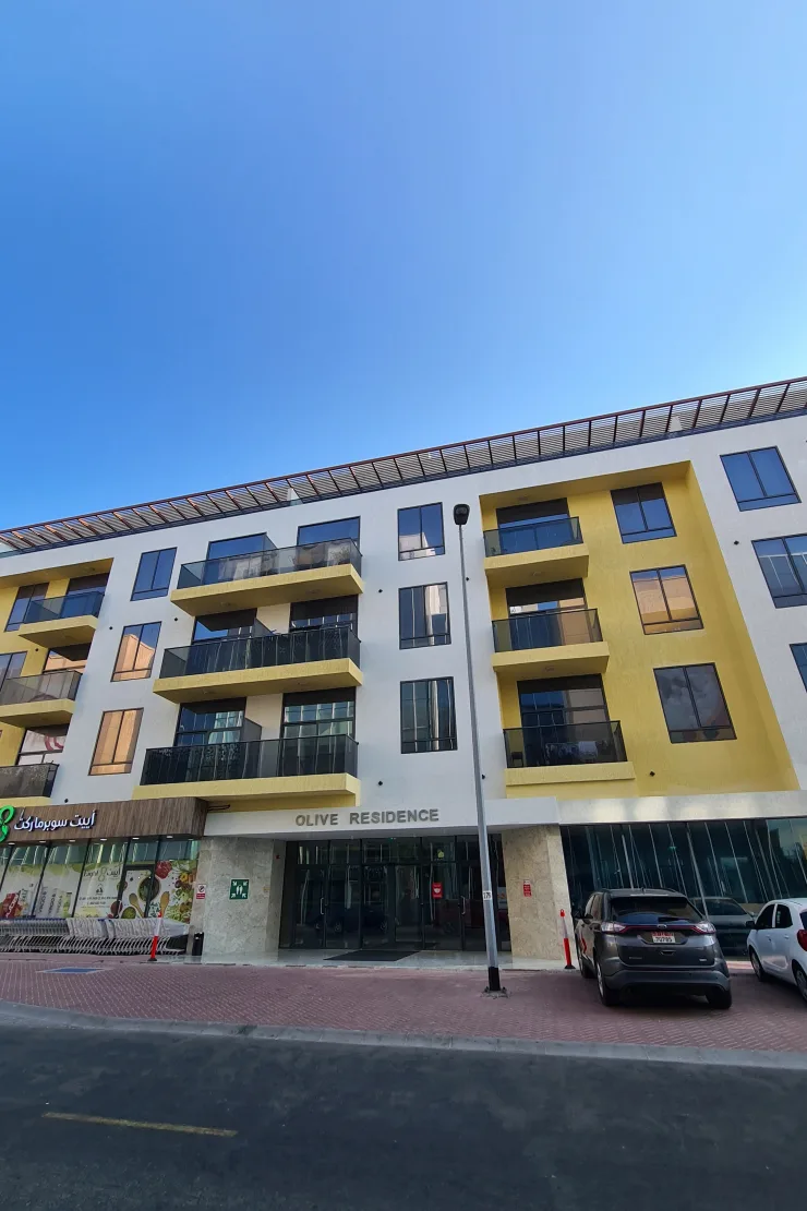 Main entrance with Olive Residence signage
