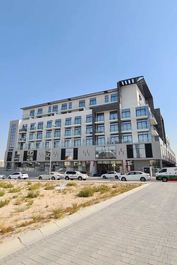 Completed building seen from street, full height