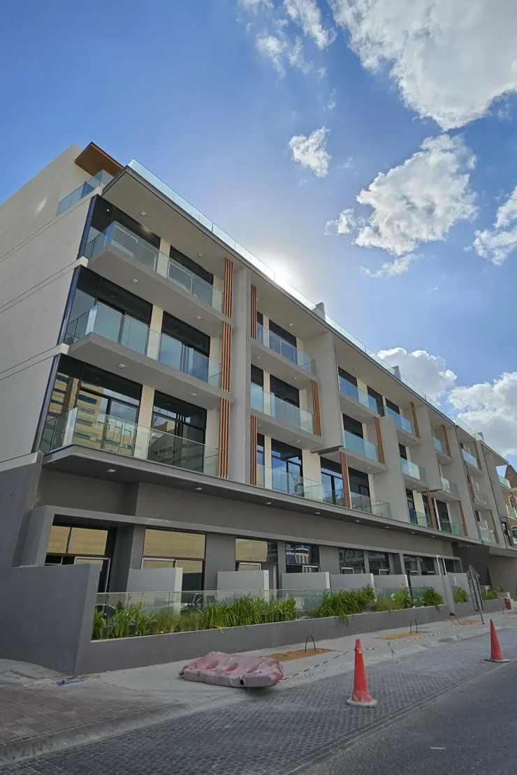 Side view of four-storey facade from street