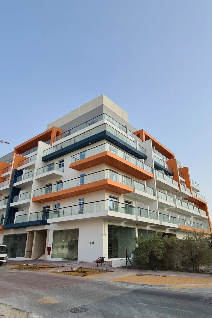Corner view with orange and navy balconies