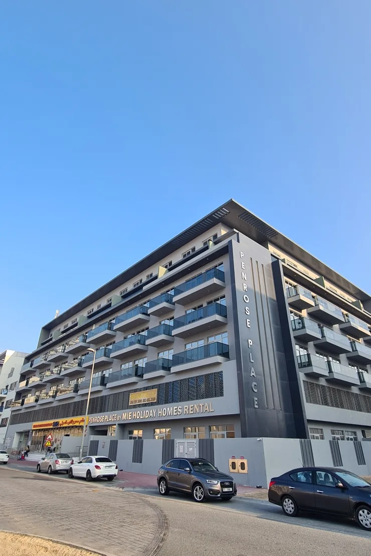 Completed Penrose Place with vertical name signage, street view