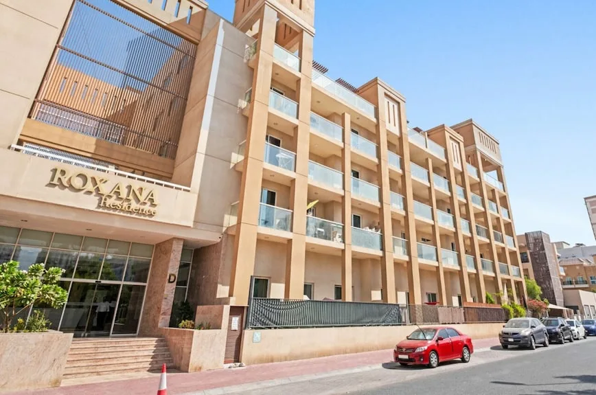Roxana Residence street facade with signage and entrance