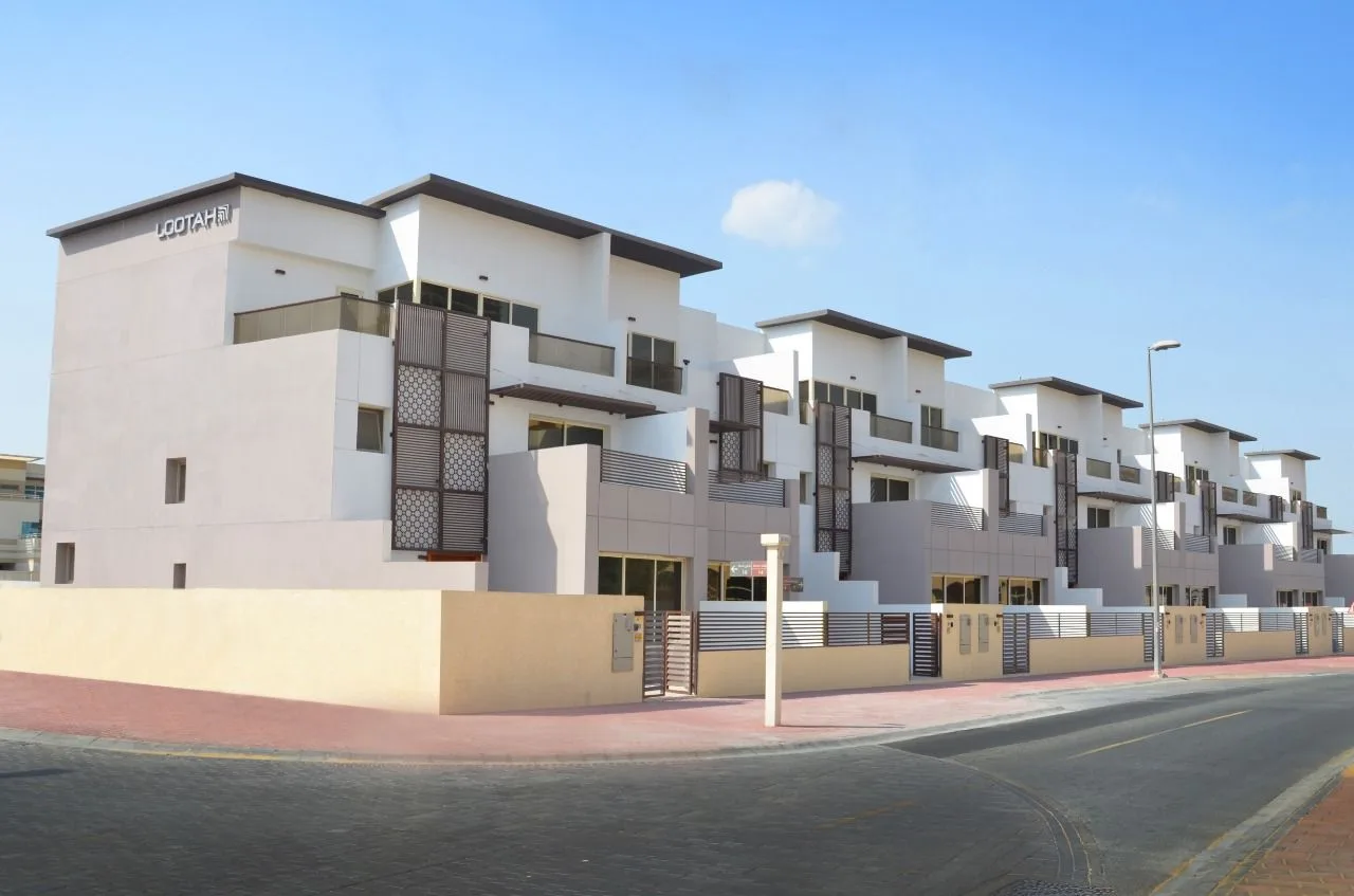 Completed townhouse block with Lootah signage, corner view