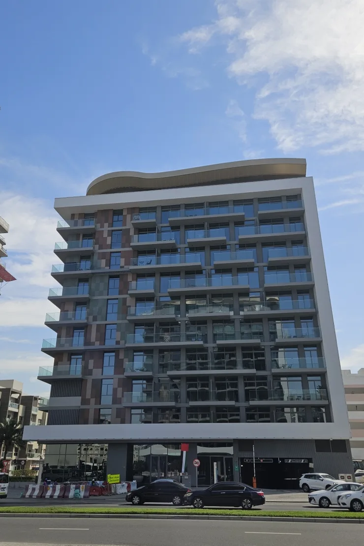 Completed tower with wavy crown, street view