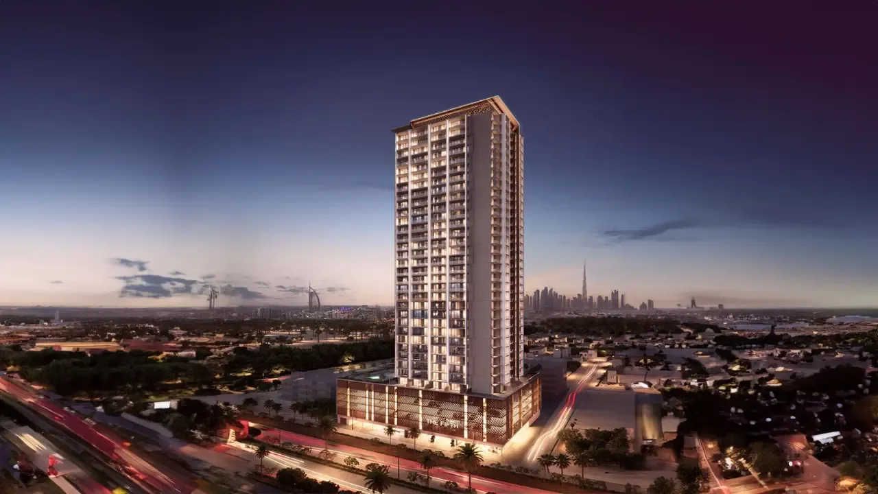 Tower with podium, aerial dusk view with skyline