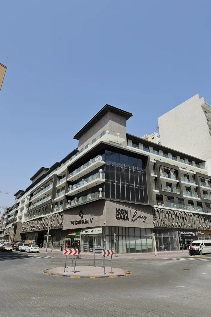 Street corner view with Icon Casa IV signage