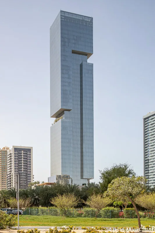 Glass tower seen from street level