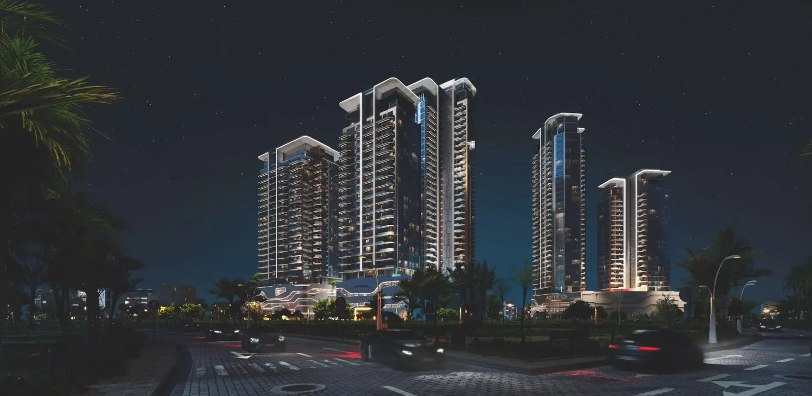 Orchard Place towers at night from street