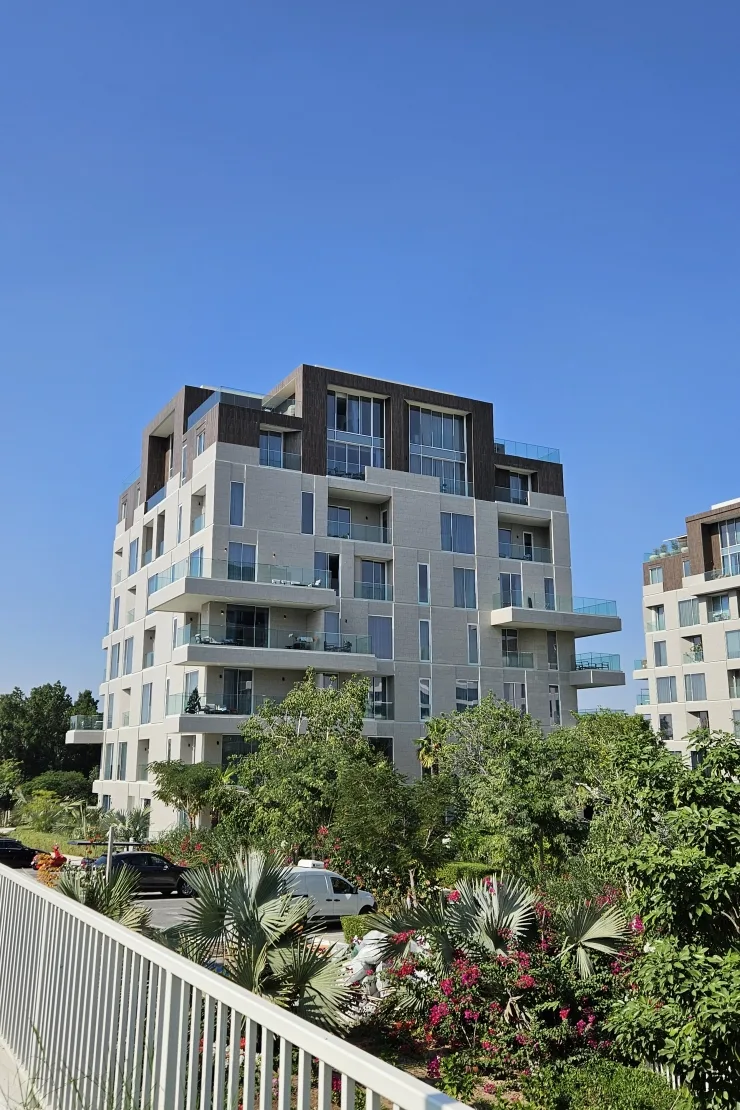 Same mid-rise seen across landscaped gardens