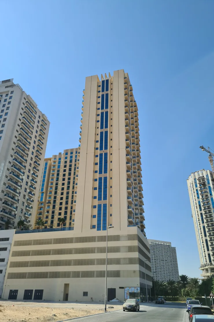Tower with podium parking levels from street