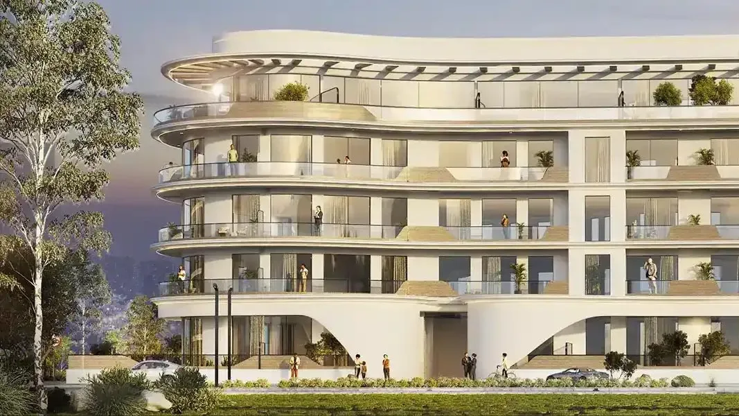 Curved balconies and entrance arches, ground to roof