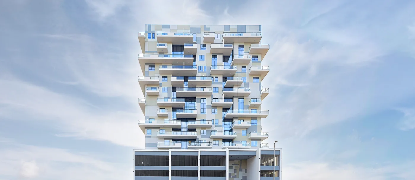 outside, full building against sky (wide banner crop)